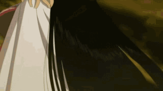 a woman with long black hair is wearing a white robe