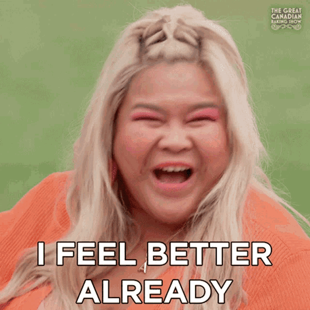 a woman with blonde hair and pink eye shadow is smiling and says i feel better already