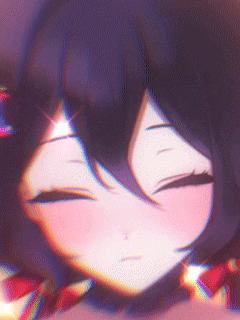 a close up of a girl 's face with a red bow tie