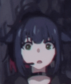 a close up of a girl with blue hair and green eyes making a funny face .