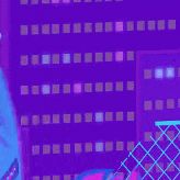 a person in a blue hoodie is standing in front of a purple background with buildings .
