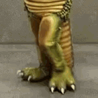 a close up of a person wearing a costume with yellow hair .