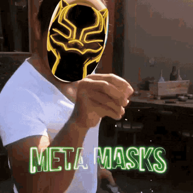 a man wearing a black panther mask is pointing at the camera with the words meta masks behind him