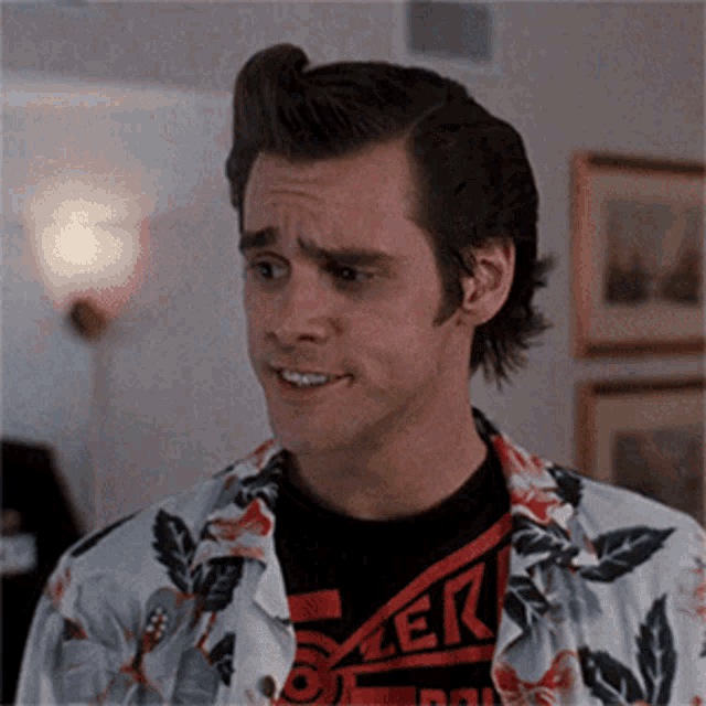 a man is wearing a shirt that says ' zer ' on it