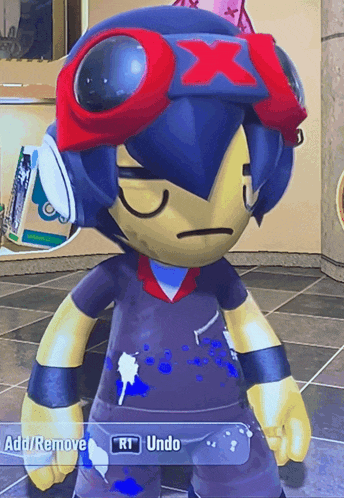 a cartoon character with a red x on his hat and goggles