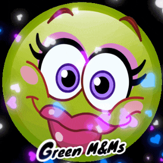 a green smiley face with purple eyes and the words green m & ms
