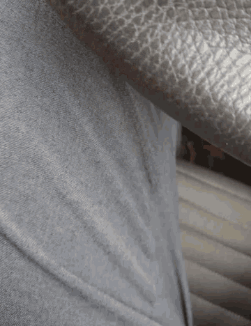 a close up of a person 's pants with a lighter in it