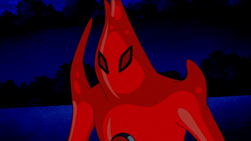 a red cartoon character with a black circle on the chest