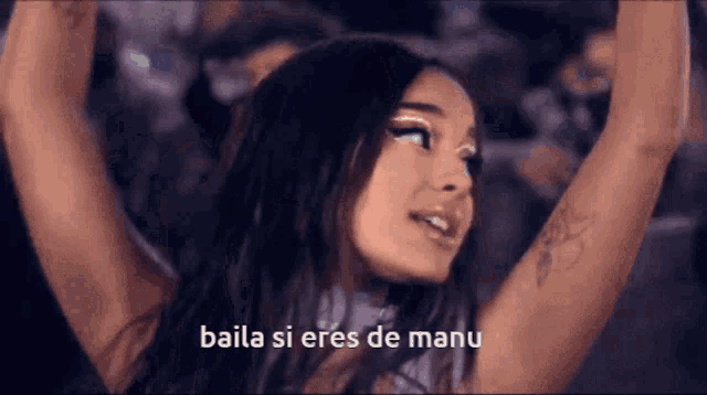 ariana grande says baila si eres de manu in a video