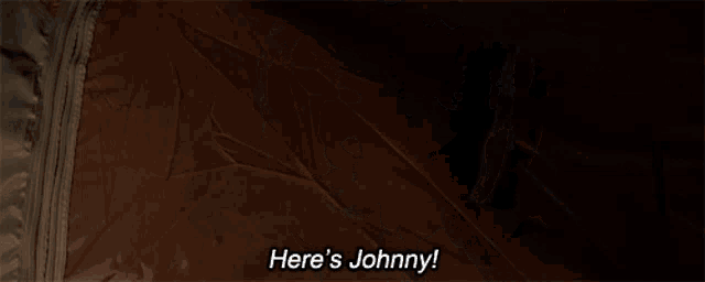 a man says here 's johnny in a tent