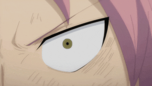 a close up of a person 's face with a white eye