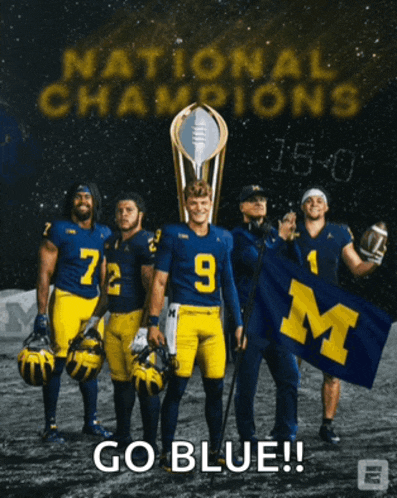 a group of football players standing in front of a sign that says national champions go blue