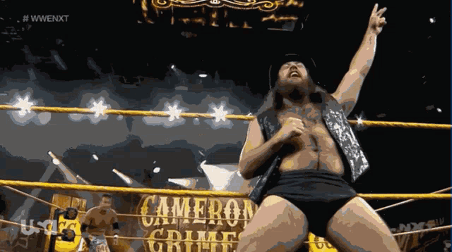 a man in a wrestling ring with cameron gruff written on it