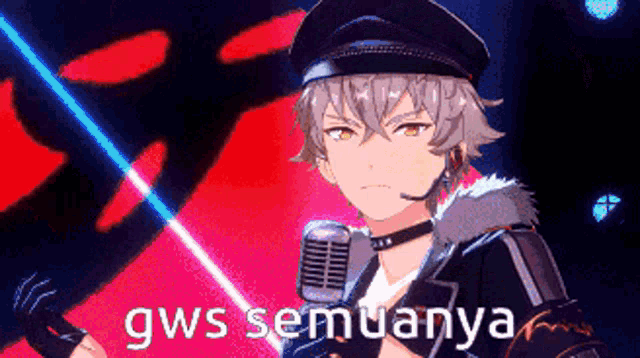 a man in a hat is holding a microphone with gws semuanya written on it .