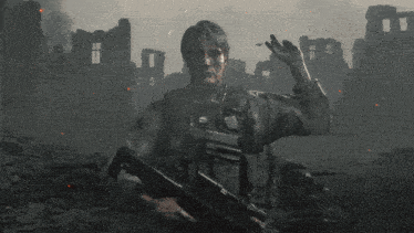 a man in a military uniform holds a gun in front of a ruined building