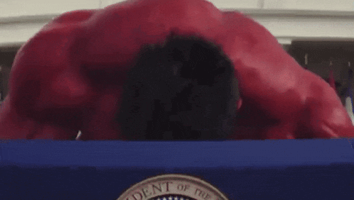 the red hulk is doing push ups in front of a white house