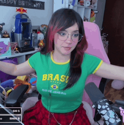 a woman wearing a green shirt with the word brasil on it