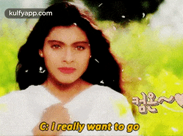 a close up of a woman 's face with the words `` i really want to go '' written on it .
