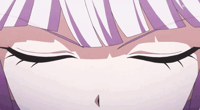 a close up of a girl 's face with a purple and white hair