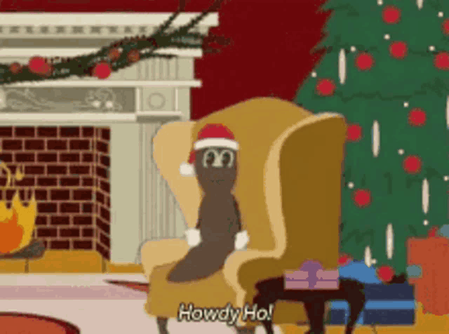 a cartoon character wearing a santa hat is sitting in a chair
