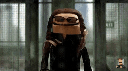 a cartoon character is wearing sunglasses and a black suit .