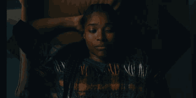 a woman laying down with her eyes closed and the words what do you think