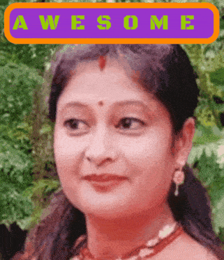 a woman with a red dot on her forehead is smiling in front of a purple awesome sign