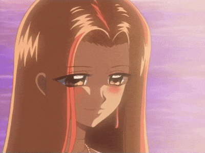 a close up of a girl 's face with long brown hair