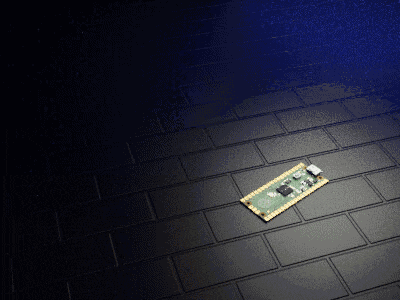 a motherboard is laying on a brick floor