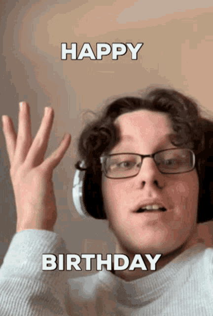 a man wearing glasses and headphones says happy birthday