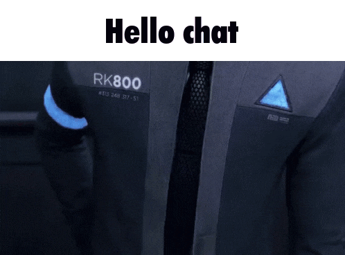 a man in a suit says hello chat on the top of his jacket