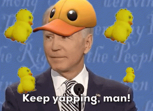 a man in a suit and tie with a duck hat says keep yapping man