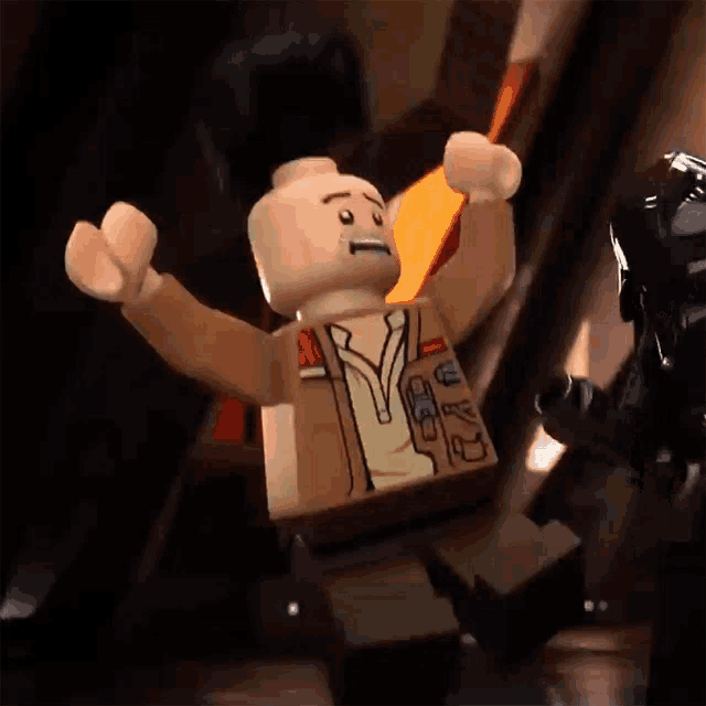 a lego man with a badge on his chest that says ' a '