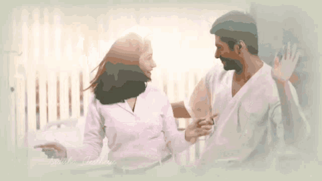 a man and a woman are dancing together and the woman 's hair is blowing in the wind ..