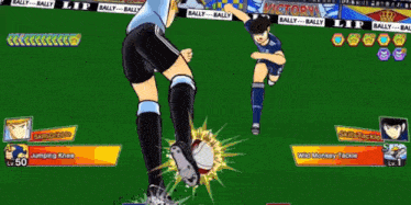 two soccer players are playing a game with a banner that says victory on it