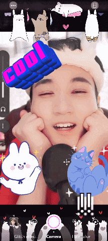 a pixelated image of a man with a cool sticker on his head