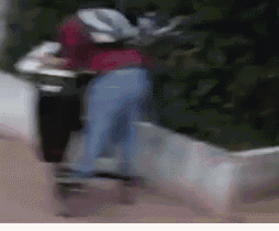 a blurry picture of a person walking down a sidewalk