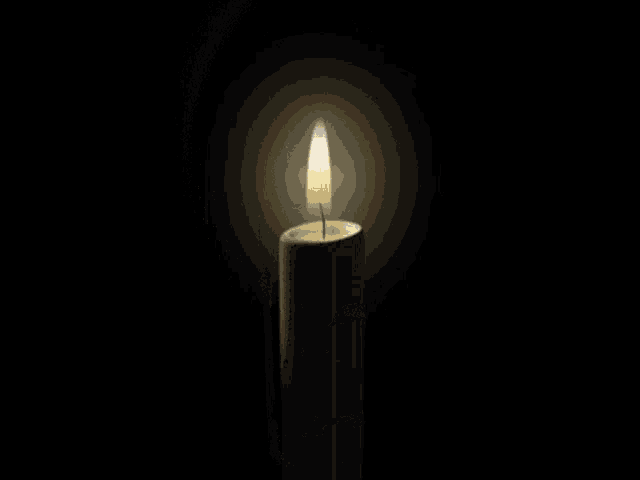 a candle with a cartoon character on it