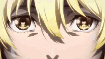 a close up of a person 's eyes with a reflection of a person