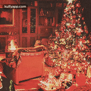 a picture of a living room with a christmas tree and the words kulfyapp.com below it