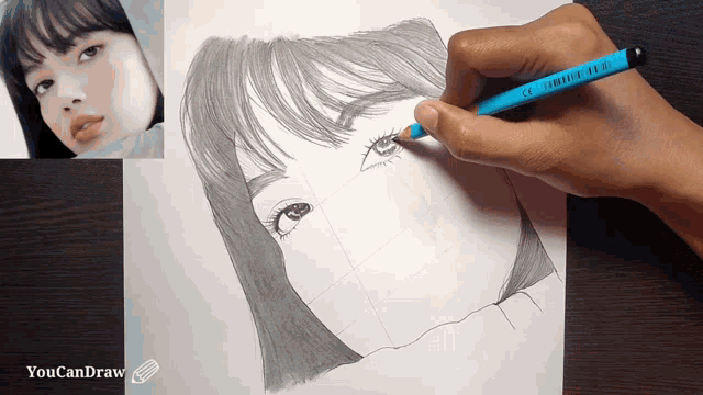 a person is drawing a woman 's face with a blue pencil called limited edition