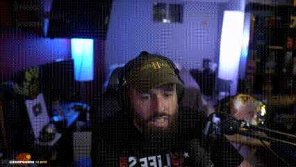 a man with a beard wearing a hat and a shirt that says 2331