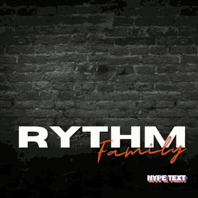 a black brick wall with the words silakan que rhythm family on it