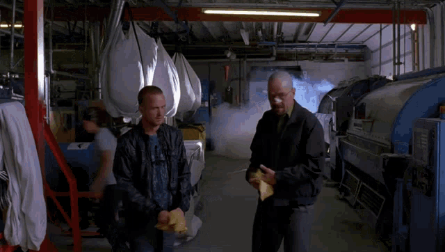 a man stands in a room with smoke coming out of the ceiling
