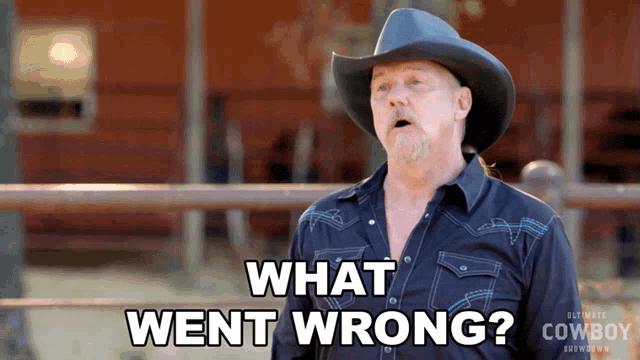 a man wearing a cowboy hat and a shirt that says what went wrong