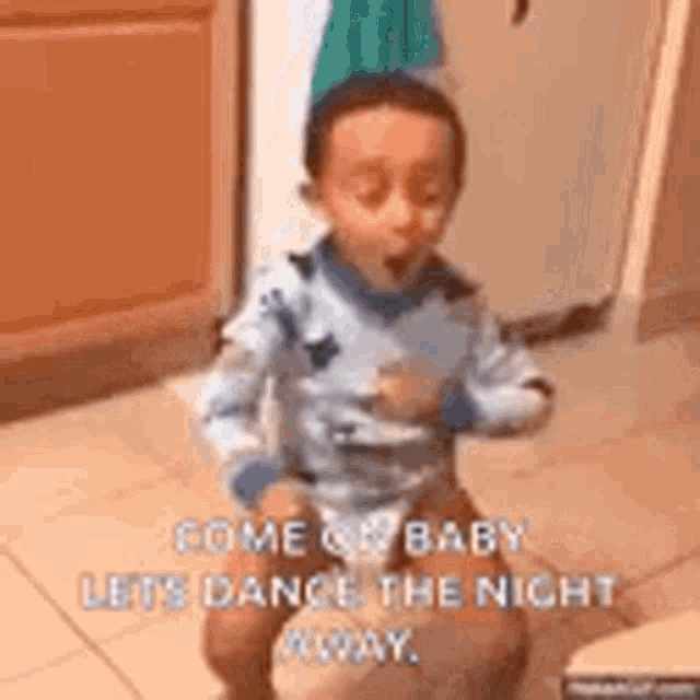 a little boy is sitting on a toilet and dancing .