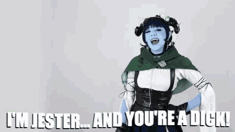 a woman in a costume is saying `` i 'm jester ... and you 're a dick ! '' .