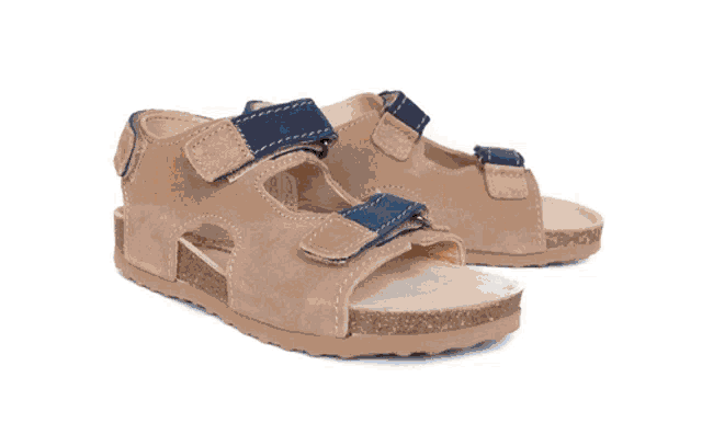 a pair of brown sandals with a blue label that says protec