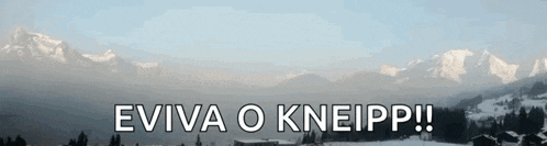 a picture of a snowy mountain with the words " eviva o kneipp " on the bottom