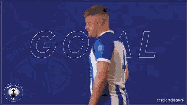 a man is taking off his shirt in front of a goal sign